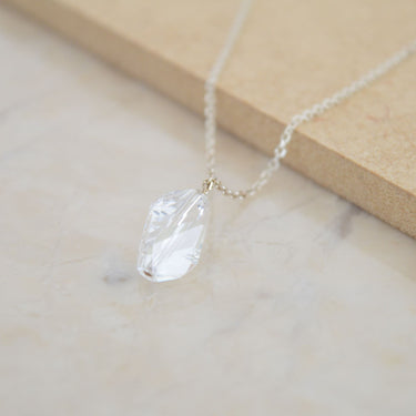 sterling silver necklace adorned with beautiful crystal in irregular shape, silver jewelry