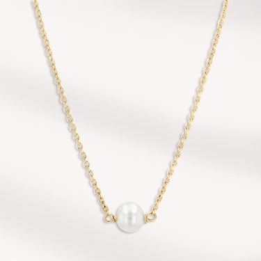 sterling silver necklace adorned with a fresh water pearl, silver jewelry